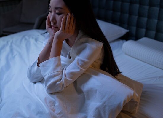 woman with insomnia due to hormone imbalance
