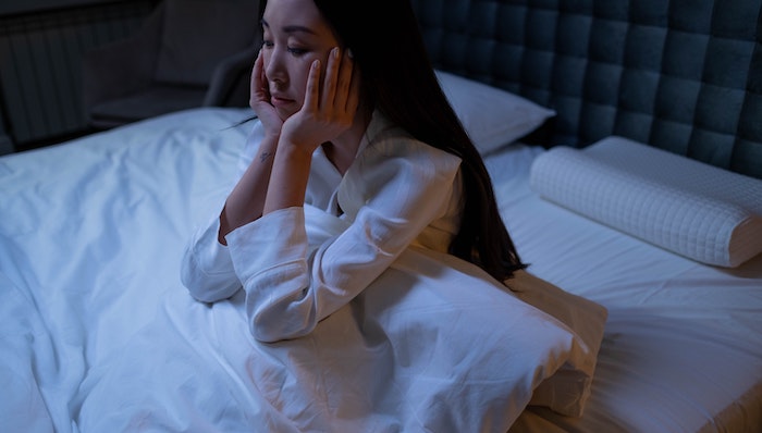 woman with insomnia due to hormone imbalance